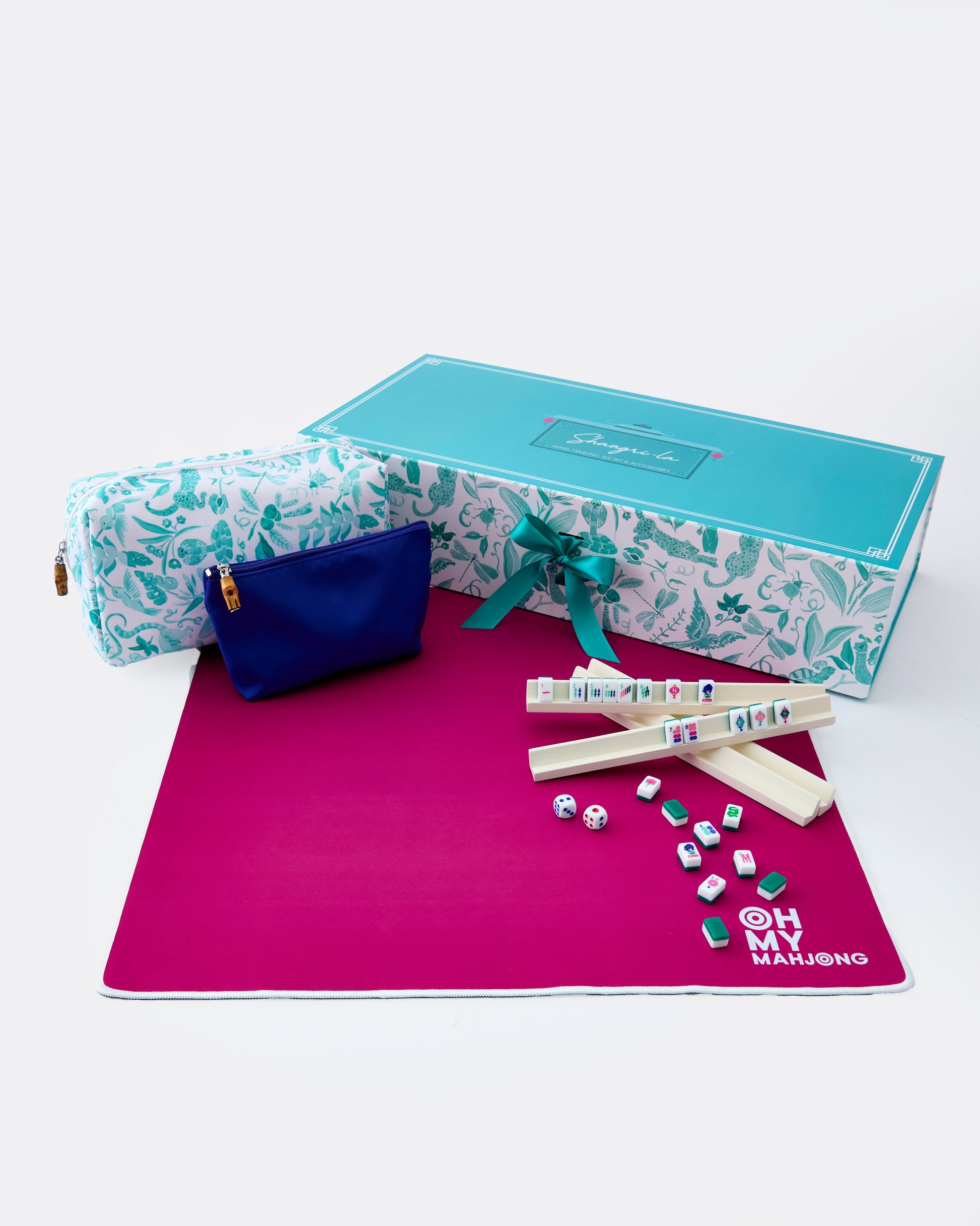 Marble-patterned box with a blue pouch, pink mat, and game pieces on a white background
